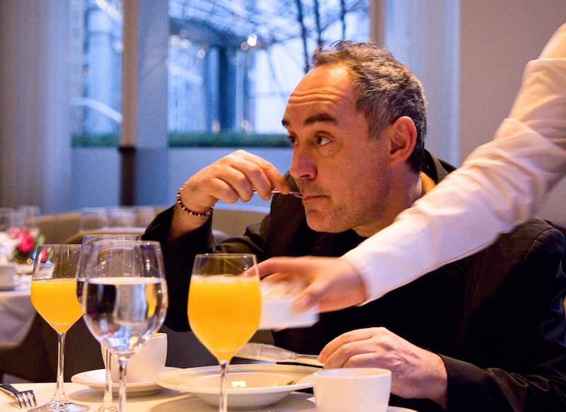 Ferran Adrià samples food from Modernist Cuisine